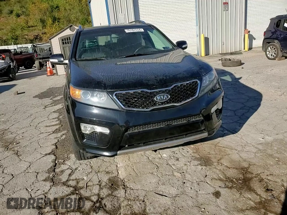 2013 Kia Sorento SX z VIN 5XYKWDA24DG385142, wystawiony jako Copart lot #75187514 z przebiegiem 119 027 mil mil oraz Szkoda całkowita • Salvage title. Historia ofert i sprzedaży dostępna na DreamBid. Obrazek 11.