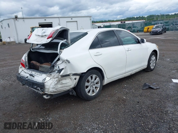 2009 Toyota Camry LE z VIN 4T1BK46K59U588966, wystawiony jako IAAI lot #42343044 z przebiegiem 157 284 mil mil oraz . Historia ofert i sprzedaży dostępna na DreamBid. Obrazek 4.
