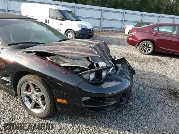 1999 Pontiac Firebird Trans Am with VIN 2G2FV32G1X2217352, listed as a Copart auction lot 79941714 with 174,580 mi miles and Salvage title. Bid and sale history available at DreamBid. Image 11.