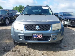 2006 Suzuki Grand Vitara Luxury z VIN JS3TE947864103082, wystawiony jako IAAI lot #42470917 z przebiegiem 155 702 mil mil oraz . Historia ofert i sprzedaży dostępna na DreamBid. Obrazek 13.