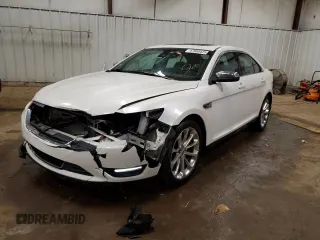 2018 Ford Taurus Limited z VIN 1FAHP2J82JG132979, wystawiony jako Copart lot #47088425 z przebiegiem 154 537 mil mil oraz Czysty tytuł • Clean title. Historia ofert i sprzedaży dostępna na DreamBid. Obrazek 1.
