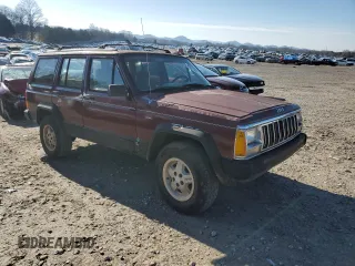 1995 Jeep Cherokee Country with VIN 1J4FT78S9SL617148, listed as a Copart auction lot 43015025 with 196,408 mi miles and Clean title. Bid and sale history available at DreamBid. Image 4.