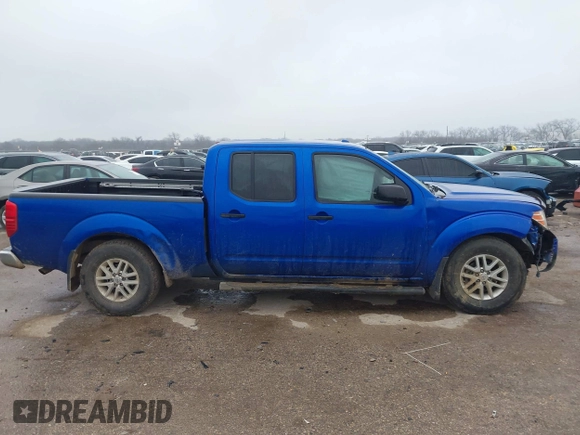 2014 Nissan Frontier SL z VIN 1N6AD0FVXEN705391, wystawiony jako IAAI lot #41539414 z przebiegiem 48 555 mil mil oraz . Historia ofert i sprzedaży dostępna na DreamBid. Obrazek 13.