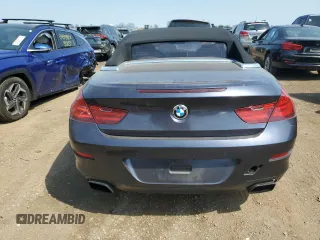 2012 BMW 6 Series 650i z VIN WBALZ3C57CDL71551, wystawiony jako Copart lot #54622705 z przebiegiem Nie podano mil oraz Szkody całkowita. Historia ofert i sprzedaży dostępna na DreamBid. Obrazek 6.