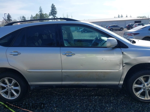 2008 Lexus RX with VIN 2T2HK31U38C069679, listed as a IAAI auction lot 42119684 with 134,196 mi miles. Bid and sale history available at carsss.com. Image 13.