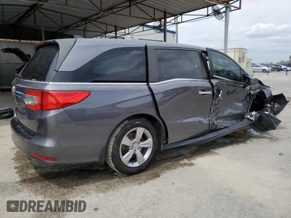 2019 Honda Odyssey EX-L with VIN 5FNRL6H75KB004911, listed as a Copart auction lot 48954335 with 74,720 mi miles and Clean Title. Bid and sale history available at carsss.com. Image 3.