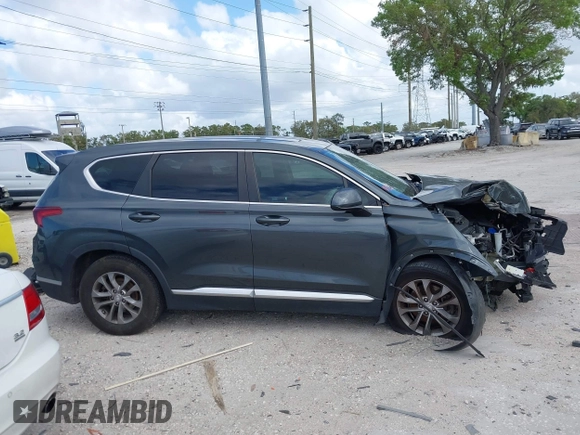 2019 Hyundai Santa Fe SE with VIN 5NMS23AD9KH037136, listed as a IAAI auction lot 41744001 with 150,745 mi miles. Bid and sale history available at carsss.com. Image 14.
