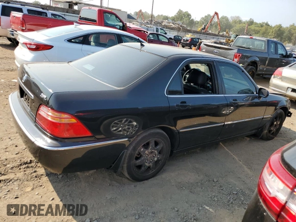2002 Acura RL with VIN JH4KA96512C013028, listed as a Copart auction lot 71436914 with 142,527 mi miles and Salvage Title. Bid and sale history available at carsss.com. Image 3.