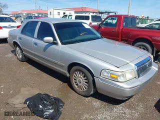 2008 Mercury Grand Marquis LS with VIN 2MEFM75V48X625878, listed as a IAAI auction lot 41874444 with 220,592 mi miles. Bid and sale history available at carsss.com. Image 1.