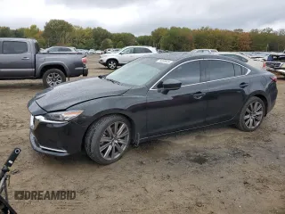 2019 Mazda 6 Grand Touring Reserve with VIN JM1GL1WY0K1508751, listed as a Copart auction lot 74069683 with 87,838 mi miles and . Bid and sale history available at carsss.com. Image 1.