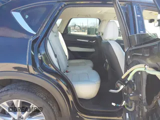 2020 Mazda CX-5 Grand Touring with VIN JM3KFBDMXL0763316, listed as a IAAI auction lot 41661958 with 64,881 mi miles and . Bid and sale history available at carsss.com. Image 8.