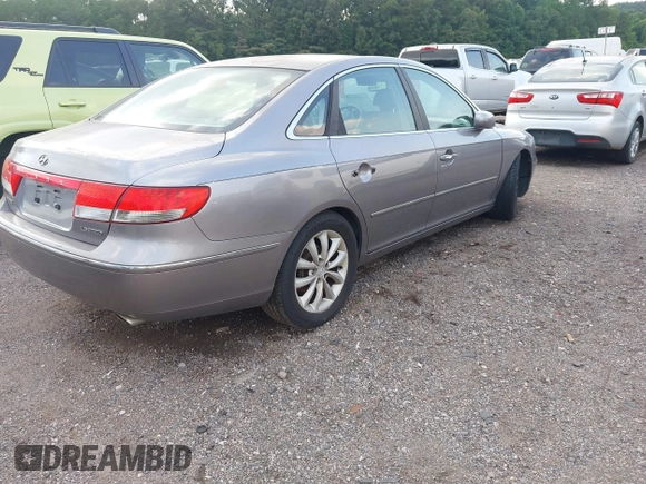 2006 Hyundai Azera SE with VIN KMHFC46F76A043396, listed as a IAAI auction lot 42398355 with 232,418 mi miles and . Bid and sale history available at DreamBid. Image 4.