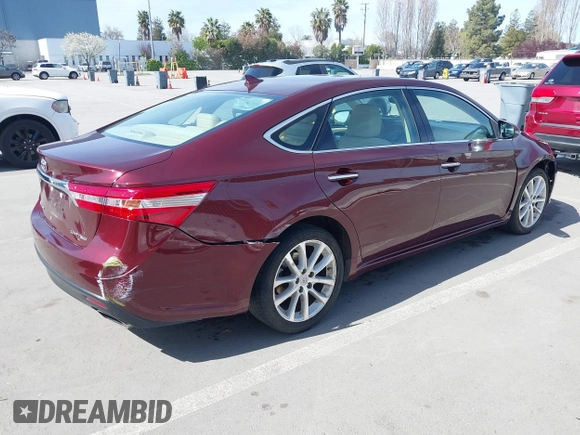 2015 Toyota Avalon Limited with VIN 4T1BK1EB8FU181008, listed as a IAAI auction lot 41850174 with 71,921 mi miles and . Bid and sale history available at DreamBid. Image 4.