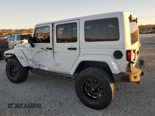 2015 Jeep Wrangler Unlimited Rubicon with VIN 1C4BJWFG5FL659017, listed as a Copart auction lot 84435034 with 69,915 mi miles and Salvage Title. Bid and sale history available at carsss.com. Image 2.
