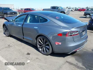 2014 Tesla Model S 60 with VIN 5YJSA1H19EFP36971, listed as a IAAI auction lot 42525811 with Not provided miles and . Bid and sale history available at DreamBid. Image 3.