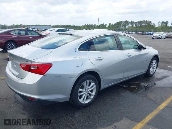 2018 Chevrolet Malibu LT with VIN 1G1ZD5ST8JF139395, listed as a IAAI auction lot 41914782 with 151,313 mi miles and . Bid and sale history available at DreamBid. Image 4.