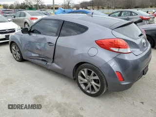 2017 Hyundai Veloster with VIN KMHTC6AD4HU310841, listed as a Copart auction lot 36048343 with 135,319 mi miles. Bid and sale history available at carsss.com. Image 2.