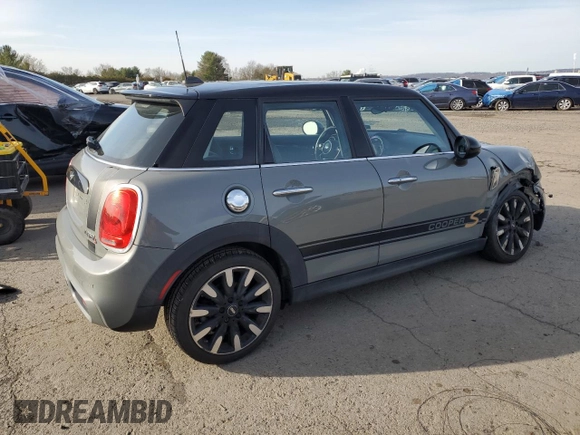2018 MINI Hardtop 4 Door Cooper S с VIN WMWXU3C58J2F50385, выставлен на аукционе Copart как лот 51168775 с пробегом 77 091 миль миль и Списание • Salvage title. История ставок и продаж доступна на DreamBid. Изображение 3.
