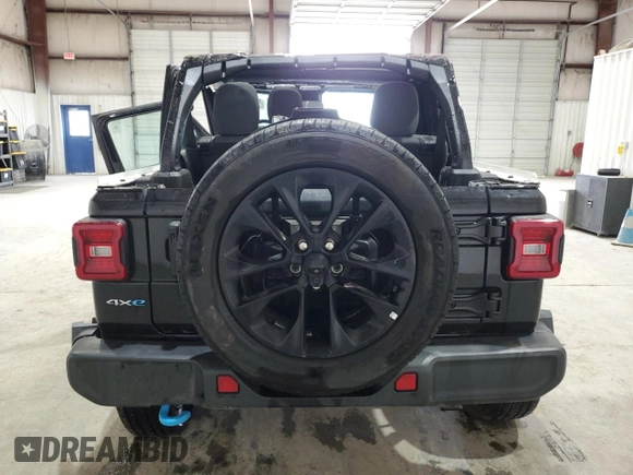 2024 Jeep Wrangler Sahara with VIN 1C4RJXP60RW257385, listed as a Copart auction lot 47660655 with 20,899 mi miles and Salvage title. Bid and sale history available at DreamBid. Image 6.
