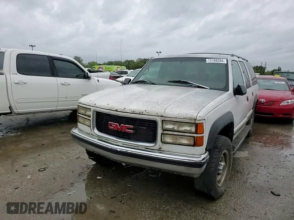 1997 GMC Suburban z VIN 1GKGK26JXVJ715765, wystawiony jako Copart lot #73188284 z przebiegiem 301 101 mil mil oraz Szkoda całkowita • Salvage title. Historia ofert i sprzedaży dostępna na DreamBid. Obrazek 10.