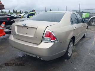 2006 Ford Fusion S with VIN 3FAFP06Z56R114621, listed as a IAAI auction lot 41901022 with 234,238 mi miles. Bid and sale history available at carsss.com. Image 4.