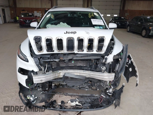 2014 Jeep Cherokee Altitude with VIN 1C4PJMCB7EW186432, listed as a IAAI auction lot 42076018 with 150,186 mi miles and . Bid and sale history available at DreamBid. Image 6.