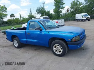 2000 Dodge Dakota z VIN 1B7FL26X1YS799143, wystawiony jako IAAI lot #42303206 z przebiegiem 148 576 mil mil oraz . Historia ofert i sprzedaży dostępna na DreamBid. Obrazek 13.