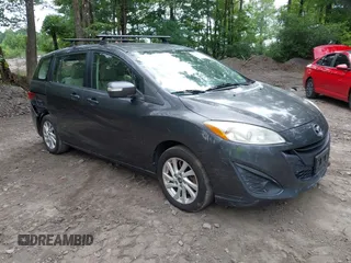 2014 Mazda 5 Sport with VIN JM1CW2BL3E0167734, listed as a IAAI auction lot 42715353 with 177,051 mi miles and . Bid and sale history available at DreamBid. Image 1.