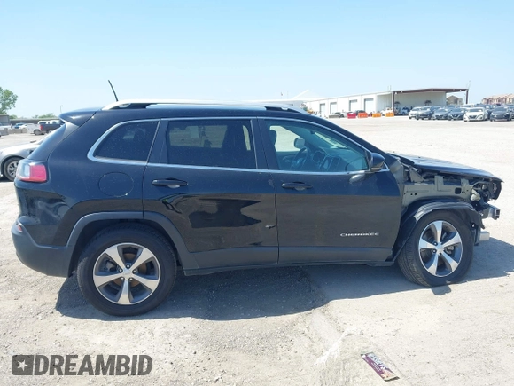 2019 Jeep Cherokee Limited z VIN 1C4PJLDB5KD469816, wystawiony jako IAAI lot #42245187 z przebiegiem 50 387 mil mil oraz . Historia ofert i sprzedaży dostępna na DreamBid. Obrazek 14.