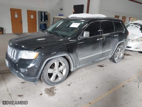 2011 Jeep Grand Cherokee Overland with VIN 1J4RR6GTXBC701186, listed as a IAAI auction lot 41553697 with 172,317 mi miles. Bid and sale history available at carsss.com. Image 17.