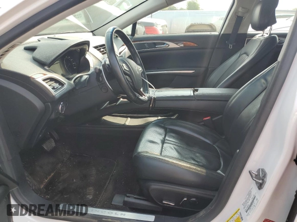 2015 Lincoln MKZ z VIN 3LN6L2GK9FR622783, wystawiony jako Copart lot #59892995 z przebiegiem 174 209 mil mil oraz Szkoda całkowita • Salvage title. Historia ofert i sprzedaży dostępna na DreamBid. Obrazek 7.
