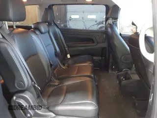 2021 Honda Odyssey Touring z VIN 5FNRL6H83MB028264, wystawiony jako IAAI lot #42206204 z przebiegiem 45 332 mil mil oraz . Historia ofert i sprzedaży dostępna na DreamBid. Obrazek 8.