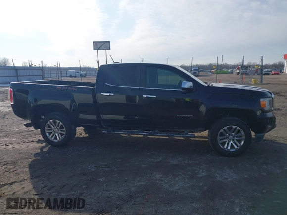 2015 GMC Canyon 4WD SLT with VIN 1GTG6CE34F1153369, listed as a IAAI auction lot 41277810 with 135,821 mi miles. Bid and sale history available at carsss.com. Image 13.