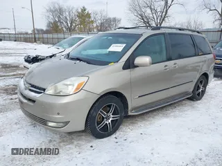 2004 Toyota Sienna XLE with VIN 5TDBA22C14S027686, listed as a IAAI auction lot 41580464 with 376,834 mi miles and . Bid and sale history available at DreamBid. Image 2.