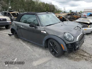 2012 MINI Convertible S with VIN WMWZP3C58CT296381, listed as a Copart auction lot 50834655 with 111,228 mi miles and Salvage Title. Bid and sale history available at DreamBid. Image 4.