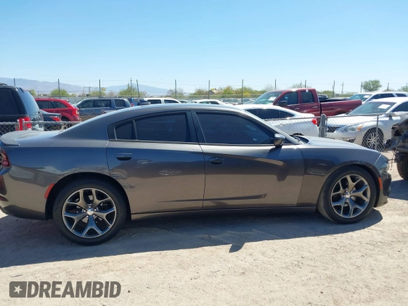 2015 Dodge Charger SXT with VIN 2C3CDXHG4FH890684, listed as a IAAI auction lot 41896958 with 118,140 mi miles and . Bid and sale history available at DreamBid. Image 13.