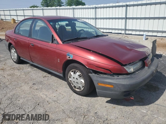 1999 Saturn SL z VIN 1G8ZH5288XZ273509, wystawiony jako Copart lot #55508215 z przebiegiem 168 946 mil mil oraz Szkoda całkowita • Salvage title. Historia ofert i sprzedaży dostępna na DreamBid. Obrazek 4.