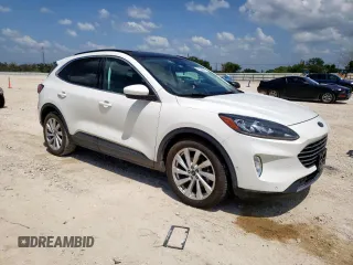 2021 Ford Escape Titanium Hybrid z VIN 1FMCU0DZ6MUA03327, wystawiony jako Copart lot #59558845 z przebiegiem 67 569 mil mil oraz Czysty tytuł • Clean title. Historia ofert i sprzedaży dostępna na DreamBid. Obrazek 4.