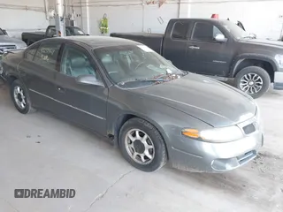 2005 Pontiac Bonneville SE z VIN 1G2HX52K55U247917, wystawiony jako IAAI lot #42231441 z przebiegiem 220 236 mil mil oraz . Historia ofert i sprzedaży dostępna na DreamBid. Obrazek 1.