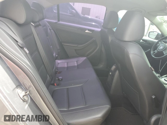 2014 Volkswagen Jetta SE z VIN 3VWD07AJ7EM395250, wystawiony jako Copart lot #65821005 z przebiegiem 155 293 mil mil oraz Czysty tytuł • Clean title. Historia ofert i sprzedaży dostępna na DreamBid. Obrazek 10.