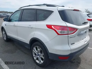 2013 Ford Escape SEL with VIN 1FMCU9HXXDUD82944, listed as a IAAI auction lot 42079667 with 97,304 mi miles. Bid and sale history available at carsss.com. Image 3.