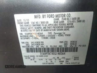 2014 Ford Taurus SHO with VIN 1FAHP2KT4EG140364, listed as a IAAI auction lot 35451709 with 82,904 mi miles. Bid and sale history available at carsss.com. Image 9.