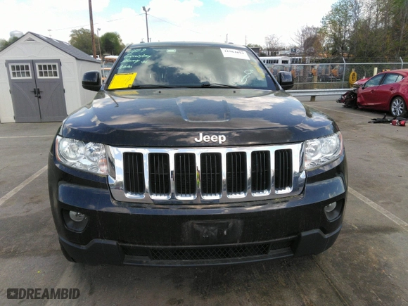 2011 Jeep Grand Cherokee Laredo with VIN 1J4RR4GTXBC538060, listed as a IAAI auction lot 41964694 with 152,999 mi miles. Bid and sale history available at carsss.com. Image 13.