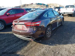 2018 Toyota Avalon XLE with VIN 4T1BK1EB2JU284174, listed as a IAAI auction lot 41555900 with 141,004 mi miles. Bid and sale history available at carsss.com. Image 4.