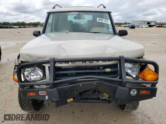 2002 Land Rover Discovery Cloth z VIN SALTY15482A752087, wystawiony jako Copart lot #69861824 z przebiegiem Nie podano mil oraz Szkoda całkowita • Salvage title. Historia ofert i sprzedaży dostępna na DreamBid. Obrazek 5.