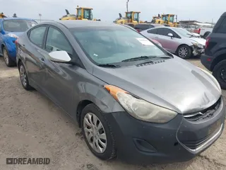 2012 Hyundai Elantra GLS with VIN 5NPDH4AE1CH091542, listed as a IAAI auction lot 42083606 with 291,687 mi miles. Bid and sale history available at carsss.com. Image 1.