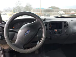2003 Ford F-150 XL with VIN 1FTRX17W23NA71890, listed as a IAAI auction lot 41716266 with 1 mi miles. Bid and sale history available at carsss.com. Image 16.