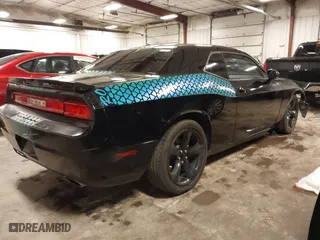 2013 Dodge Challenger SXT with VIN 2C3CDYAG2DH663247, listed as a IAAI auction lot 41908657 with 172,316 mi miles. Bid and sale history available at carsss.com. Image 4.