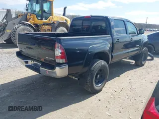 2010 Toyota Tacoma PreRunner with VIN 3TMJU4GN5AM100756, listed as a IAAI auction lot 41920188 with 90,776 mi miles and . Bid and sale history available at DreamBid. Image 4.