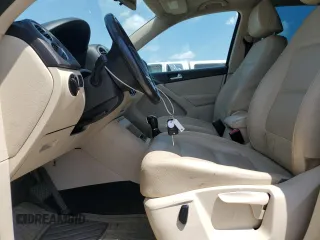 2012 Volkswagen Tiguan SEL with VIN WVGAV7AX2CW605399, listed as a Copart auction lot 55201935 with 128,527 mi miles and Clean Title. Bid and sale history available at DreamBid. Image 7.